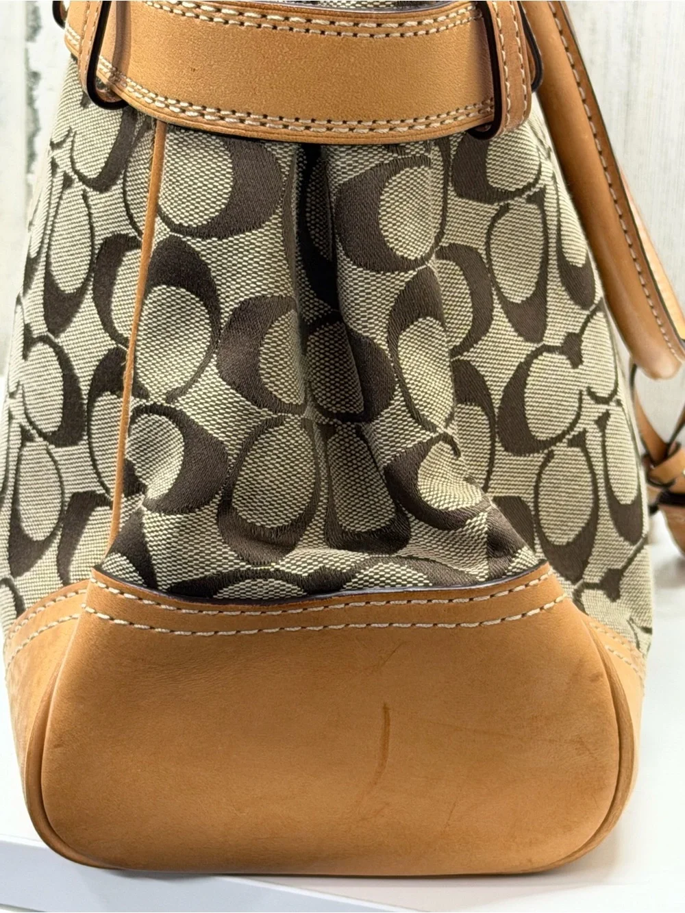 Coach iconic signature